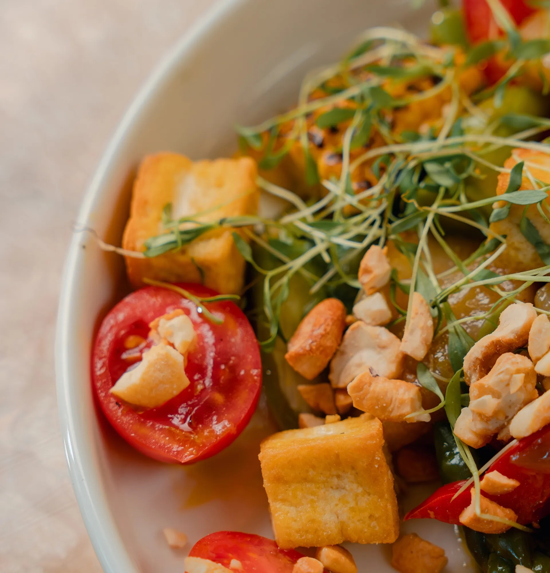 Salad with tofu, asparagus, and caramelized pear