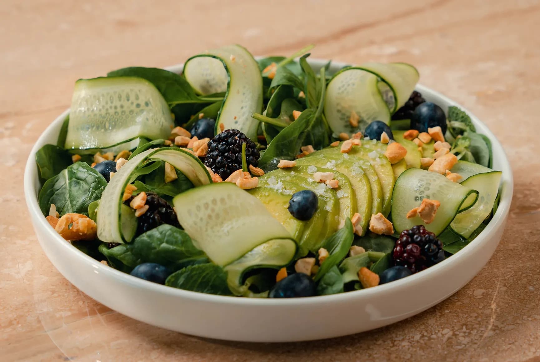 Salad with berries and avocado